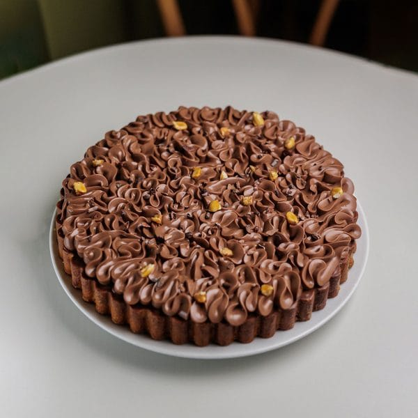 Tarteleta de chocolate, maní y banana